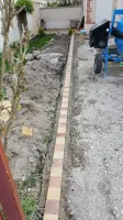 Réalisation d'une cours en béton désactivé en mignonette dans une maison individu (1)